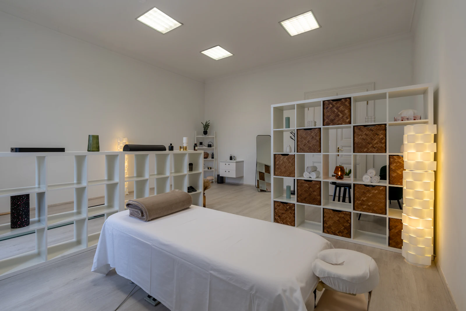 A massage room is clean and ready for a session